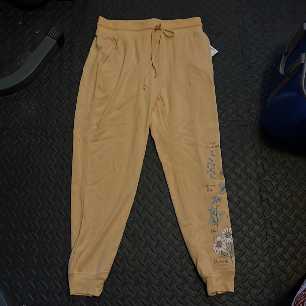 Yellow floral patterned sweat pants/joggers